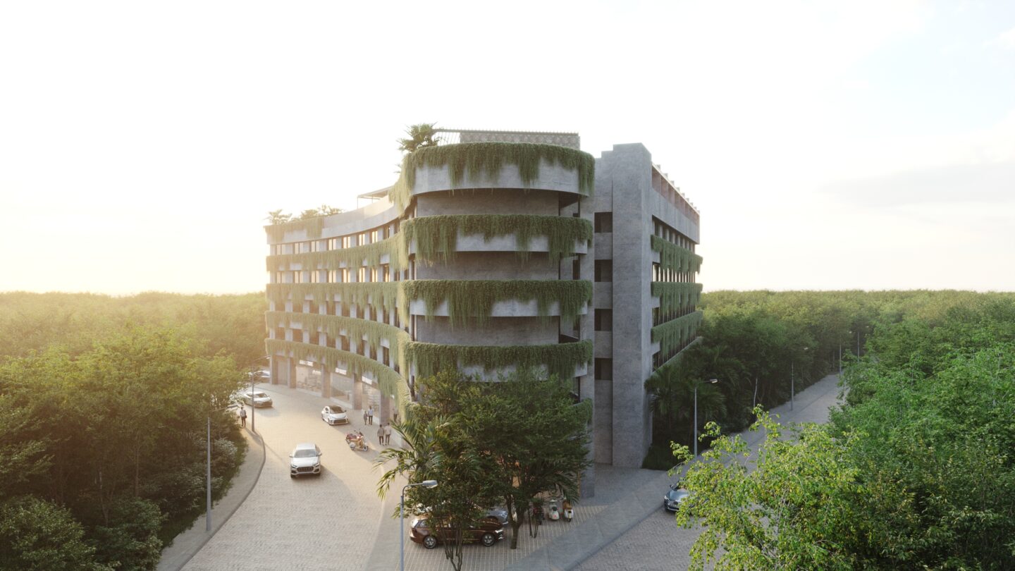 Fachada del desarrollo Macondo Tulum con arquitectura de líneas curvas, muros recubiertos de vegetación, amplios ventanales y entorno rodeado de selva, dentro de los departamentos en venta en Tulum.